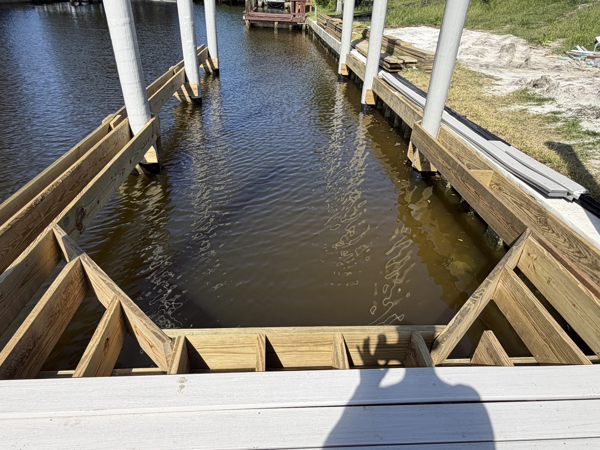 Dock framing under construction, canal property